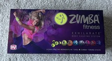 Zumba Fitness Exhilarate Body Shaping System 7 DVDs & 2 Toning Sticks Boxed