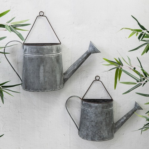 Metal wall watering cans - wall,