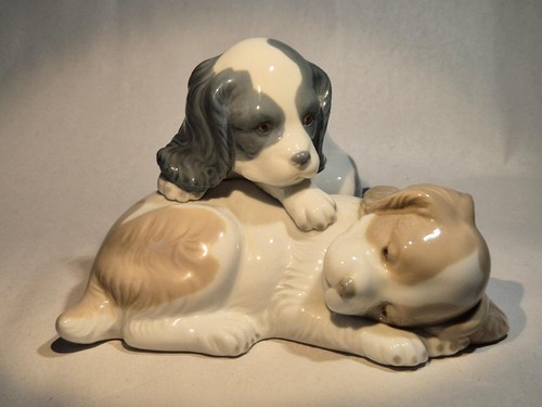 Nao lladro figurine - by,