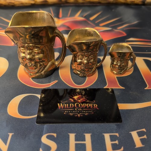 Brass toby jugs - brass,
