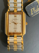 Philip Persio Tank watch with tags.