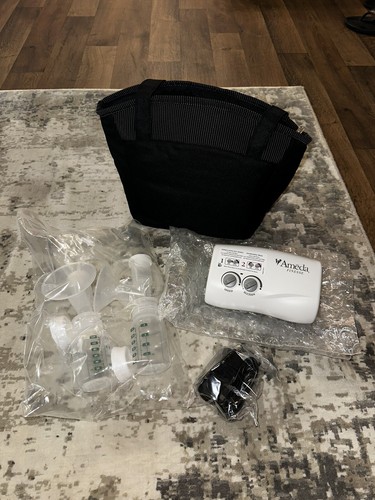 New ameda breast pump finesse - ,