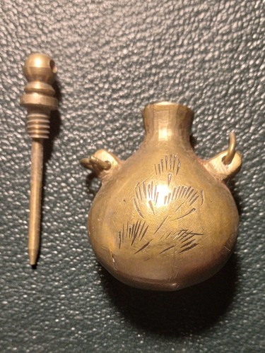 Antique brass poison - an,