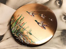 Stratton ducks in flight