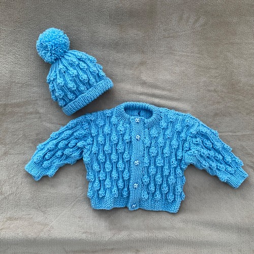 Hand knitted baby jacket - hand, and