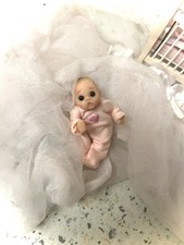 Polymer clay baby ,artist