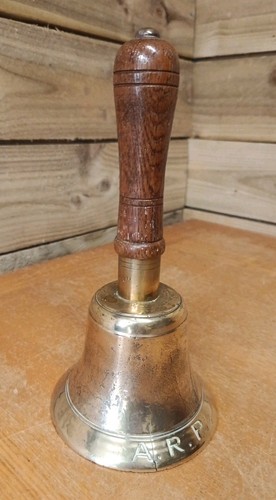 Hand held brass bell - hand, marked