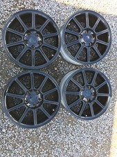 Set of 4 Gloss Black Genuine