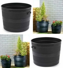 BLACK PLASTIC PLANTER PLANT