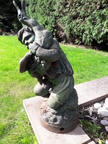 Antique cast iron boy with - cast, a