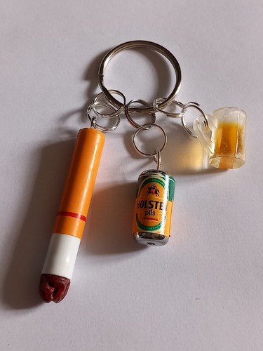 Holsten pils cigarette butt - holsten, pils,