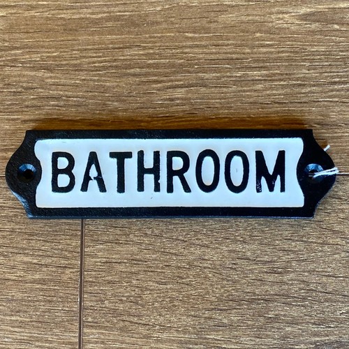 Cast iron door signs - door,