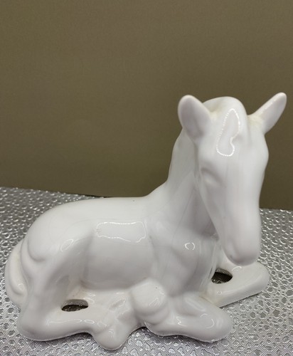 Ornament horse laying down - laying,