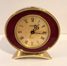 Swiss Looping 8 day 15 jewels red enamel alarm desk clock brass