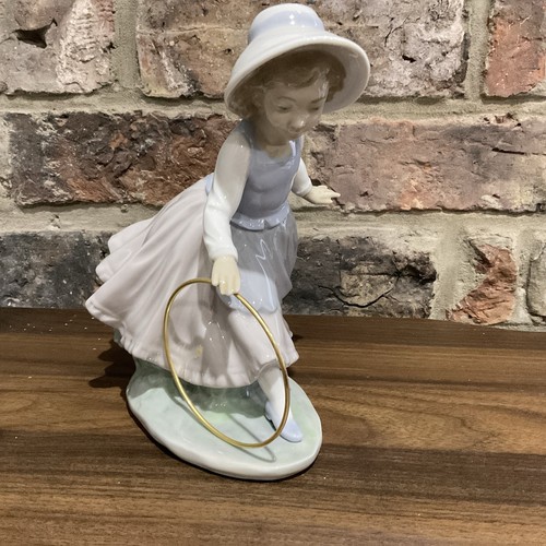 Nao lladro figurine - by,
