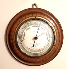 Antique walnut circular wall barometer by Negretti & Zambra. C1900