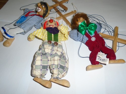 Three 1990s clown wooden
