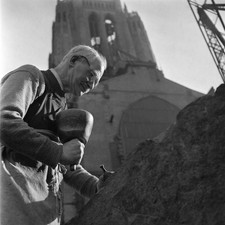 Masons working blocks of stone