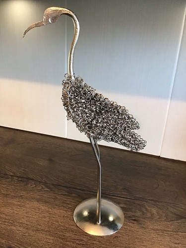 Twisted silver tone metalwork - twisted, silver-tone