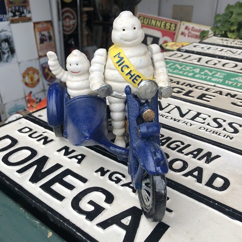 Michelin man with passenger - man,