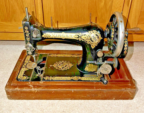 Antique singer hand - singer,
