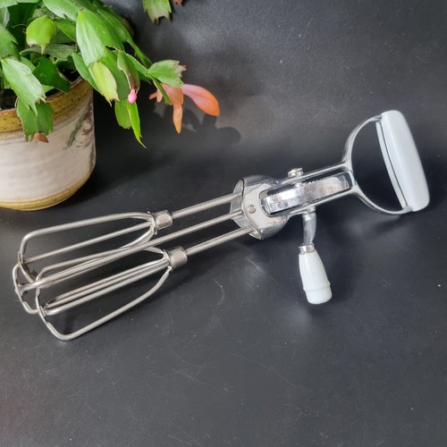 Vintage rotary hand whisk egg - hand,