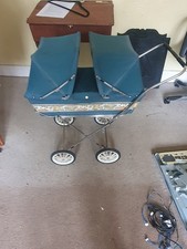 Vintage Silvercross twin dolls