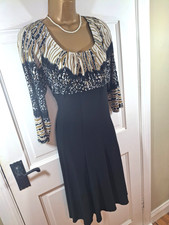 Frank Lyman Black & Gold