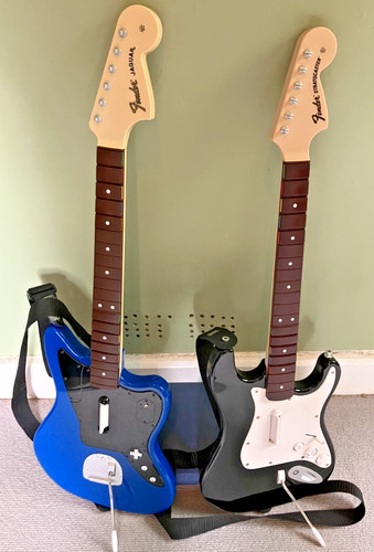 Two rock band guitars - rock,