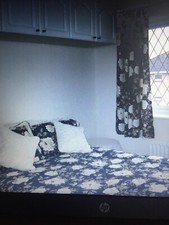 Complete bedding set. Quilt 79" x 75". Pillow cases, fitted bedspread +Curtains 