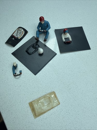 Vintage 1960s slot car drivers - car,