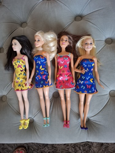 Barbie dolls in matching - 4,