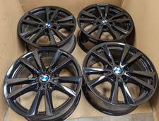 4x GENUINE GLOSS BLACK BMW X5
