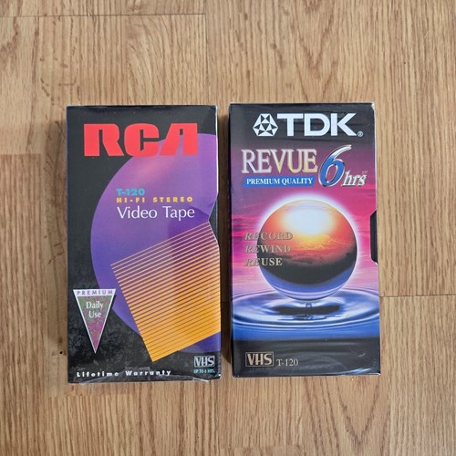 Lot sealed vhs tapes - lot,