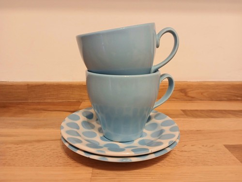 Two tams ware cups and - cups,