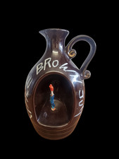 'Vintage Little Brown Jug Decanter Musical Box Pottery with a Spinning man.