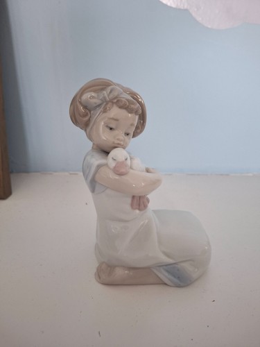 Lladro girl holding duck