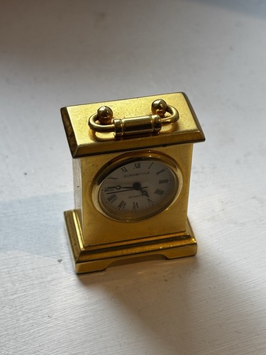Small gold tone antique clock - antique,
