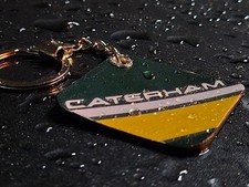 Genuine Race Used Caterham CT01 F1 Sidepod Bodywork Keyring. 925 Silver Parts