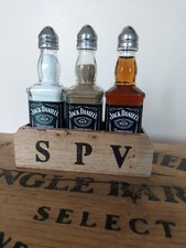 JACK DANIELS salt,pepper, and vinegar shakers in a wooden stand 