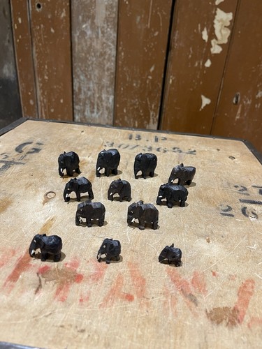 Tiny ebony elephants figures - elephants,