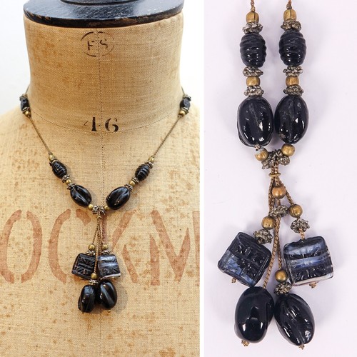 Old vintage black tassel - old,