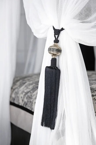 Pair moroccan tassel - a, of