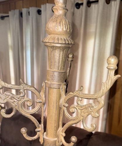 Antique cast iron coat hat - coat,