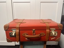 Globe-Trotter Red Suitcase
