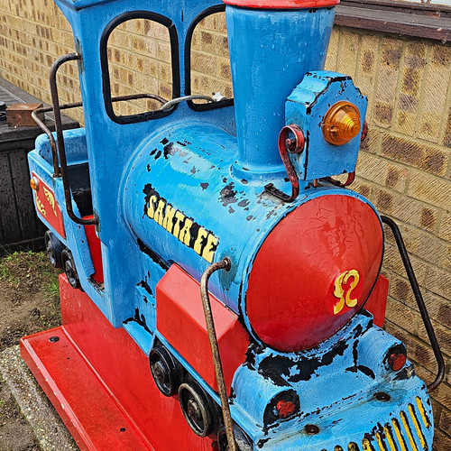 Coin operated ride - operated, train