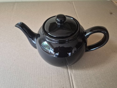 Large black tea pot