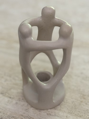 Candle holder hand - candle, carved