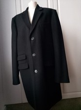 Crombie coats. Black. Worn