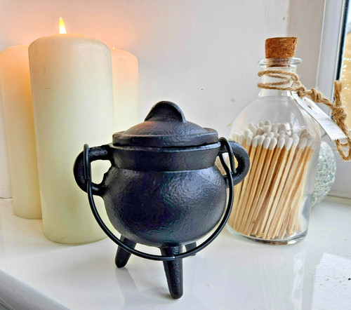 Cast iron hanging witch - cast,